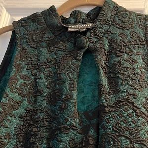 Green and black sleeveless dress